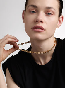 Discover our 45 cm gold chain, an elegant and timeless design with each link handwoven in bronze with 24K gold plating. Perfect to wear alone or paired with our charms.